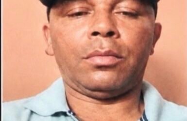 Mulher é morta no povoado Água Boa, em Riachão do Dantas, em caso tratado como feminicídio; Polícia Civil divulga imagem de suspeito foragido e pede ajuda da população para localizá-lo